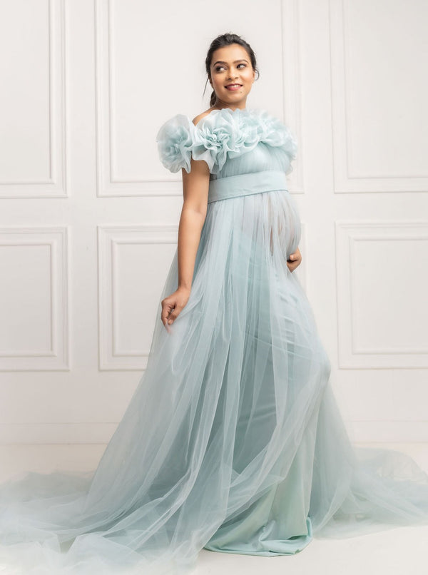 ur "Elsa" gown boasts a full-length silhouette , gracefully hugging your curves and allowing you to move with poise and confidence. Its versatility shines through with a detachable net shrug, giving you the freedom to switch up your look effortlessly.